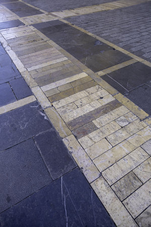 Cobblestone floor with typical shapes of the city of Lisbonの写真素材