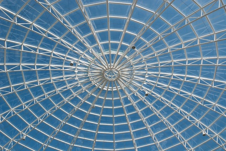 coverage of a steel and glass building with sky backgroundの写真素材