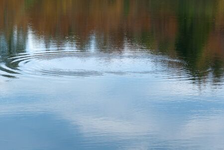 autumn reflected on the lake of the bocco in liguriaの写真素材