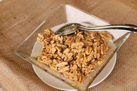 walnuts with a silver spoonの写真素材