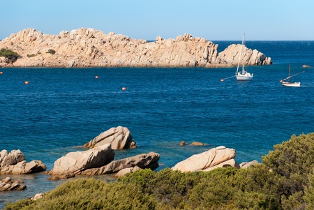 sea landscape with pink granite island La Maddalena in Sardiniaの写真素材
