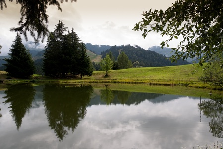 reflections on Lac Des Joncs in Switzerlandの写真素材