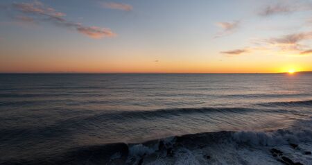 overview of a sunset over the seaの写真素材