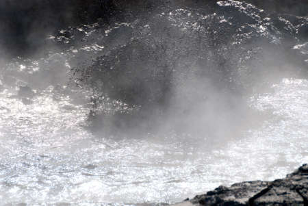 spray of boiling mud to Namafjall in Icelandの写真素材
