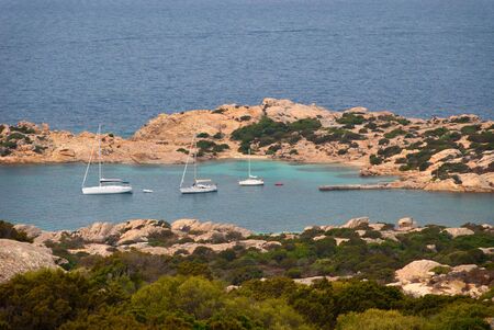 boats on the island of Caprera in Sardiniaの写真素材