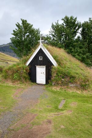 small wooden church with a grass roof in Icelandの写真素材