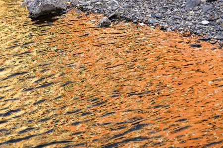 reflections on the water in Genoa Italyの写真素材
