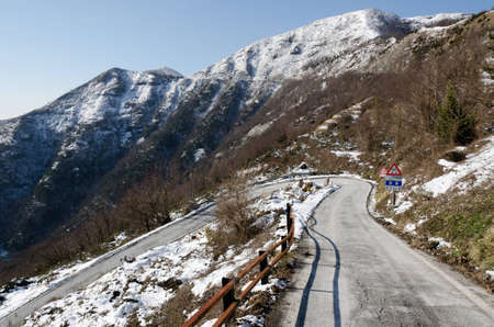 snowy mountain road in Genoaの写真素材