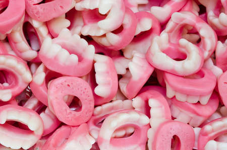 candies in the shape of dentures with gums and teethの写真素材