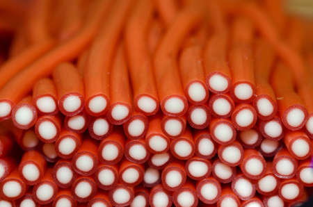 candy licorice rod-shaped orangeの写真素材