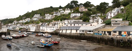overview of Polperro with boats aground in Cornwall