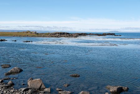 sea and rocks on the vatnsness peninsula in Iceland の写真素材
