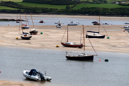 Boats at low tide at Wadebridge in Cornwall