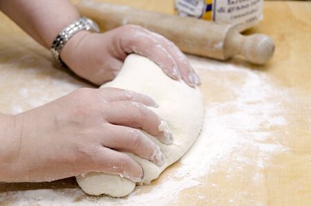 hands that knead breadの写真素材