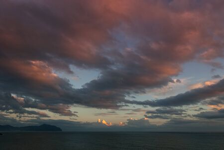 sunset over the sea in Genoa Boccadasse in Italyの写真素材