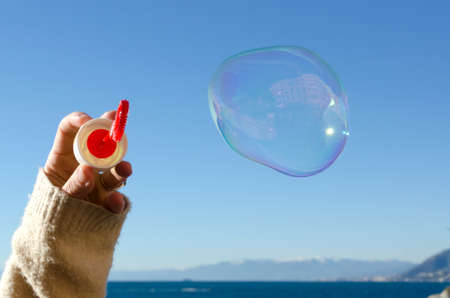 soap bubbles with reflection of the village of Camogli