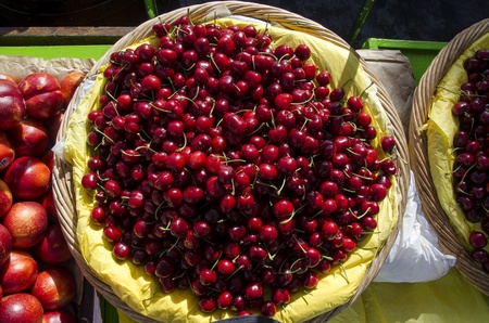 cherries in the basket in San Francisco, Californiaの写真素材