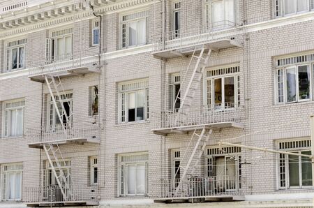 facade of a building with fire escapes in San Franciscoの写真素材