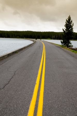 road on Yellowstone Lake in Wyoming in the United States of Americaの写真素材