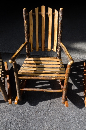 rocking chair with wooden logs in Yellowstoneの写真素材