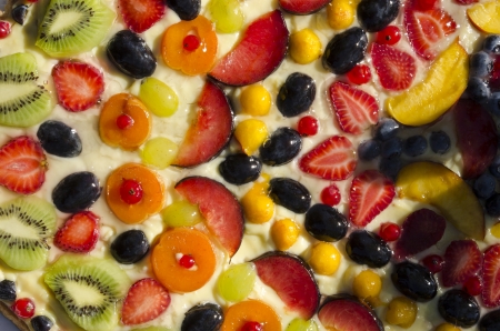 wedding cake with cream and fruitの写真素材