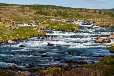 river with rapids near Gullfoss in Icelandの写真素材
