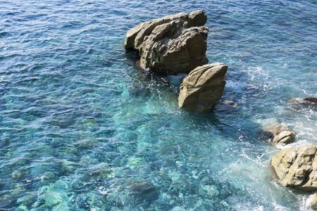 transparent sea on the promenade of Varazze in Liguriaの写真素材