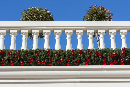balcony with pots and Christmas decorationsの写真素材
