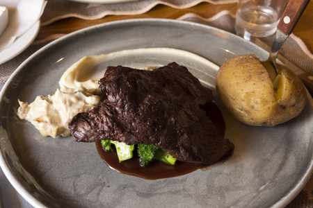 dish with whale steak in Norway in Lofotenの写真素材