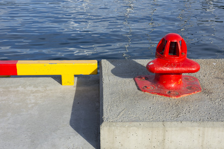red bollard in the port of Tromso at the Lofoten islands in Norway