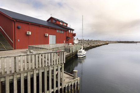 red house in Andenes at the beginning of the National Tourist Route Andøya in Lofoten in Norwayのeditorial素材