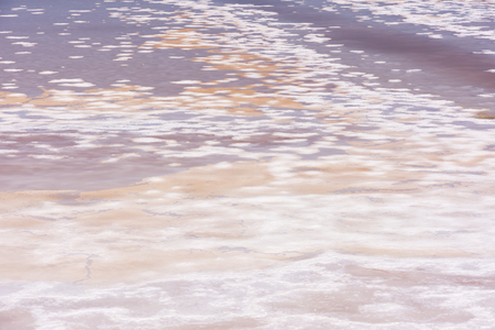 salt collection at the saltworks of Trapani in Sicily in Italyの写真素材