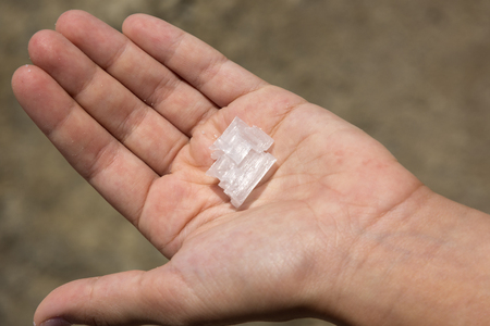 salt crystal in your hands in Trapani in Sicilyの写真素材