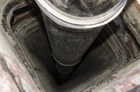 chimney during the renovation of a roof in Italyの写真素材