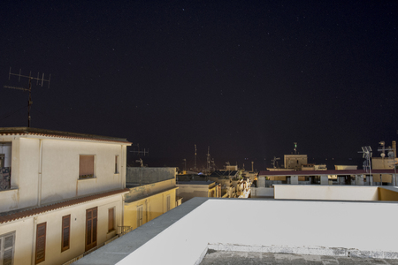 night landscape on the houses of Balestrate in Sicilyの写真素材
