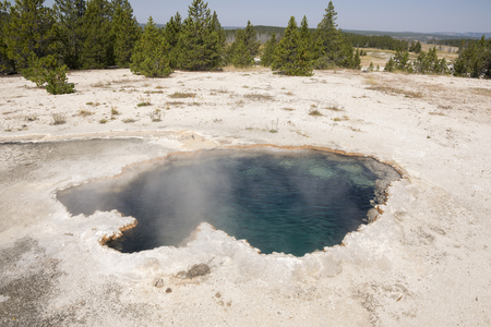 Geysers in the Firehole canyon drive in Yellowstone National Park in Wyomingの写真素材