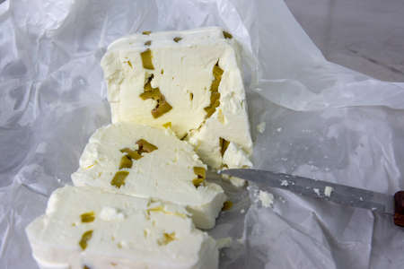 phases of Greek feta cheese production in a cheese factory in Greece
