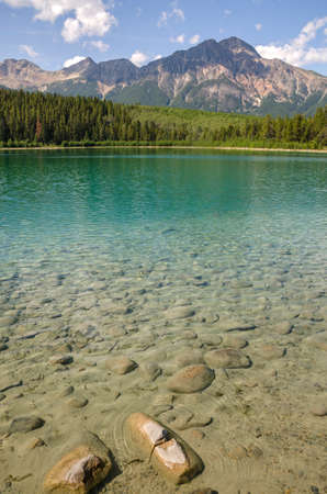 Reflections on Patricia Lake in Jasper Canadaの写真素材