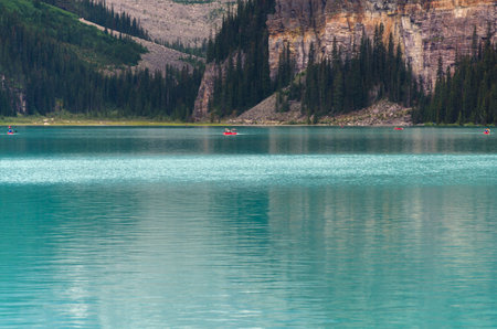 Lake Louise in cloudy day in summer in Banff National Park, Alberta, Canadaの写真素材