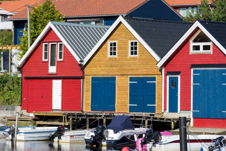colorful wooden houses on the sea in Osoyro in Norway