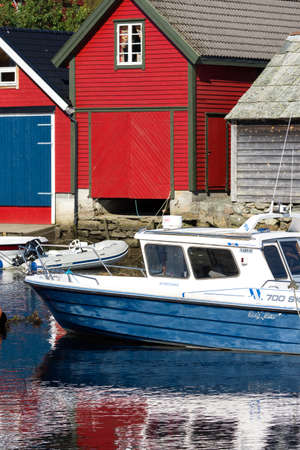 colorful wooden houses on the sea in Osoyro in Norwayの写真素材