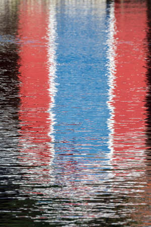 colorful wooden houses on the sea in Osoyro in Norwayの写真素材