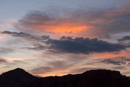 orange clouds at sunset in Capitol Reef National Park in United States of Americaの写真素材