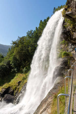 Steinsdalsfossen waterfall and landscape in Norwayの写真素材