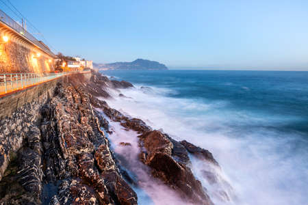 sunset on the sea promenade in Genoa Nervi in Liguriaの写真素材