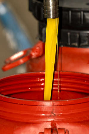 transformation of olives into oil in an oil mill in greeceの写真素材