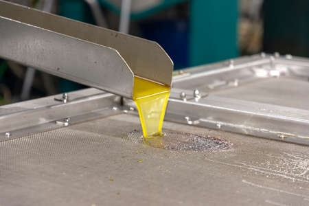 transformation of olives into oil in an oil mill in greeceの写真素材