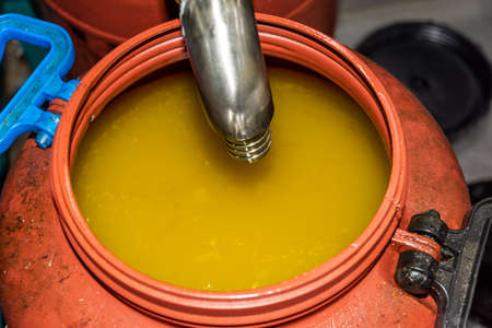 transformation of olives into oil in an oil mill in greeceの写真素材