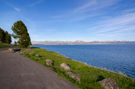 sunrise in Yellowstone lake in Yellowstone National Park in Wyomingの写真素材