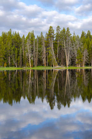 sunrise in Yellowstone lake in Yellowstone National Park in Wyomingの写真素材